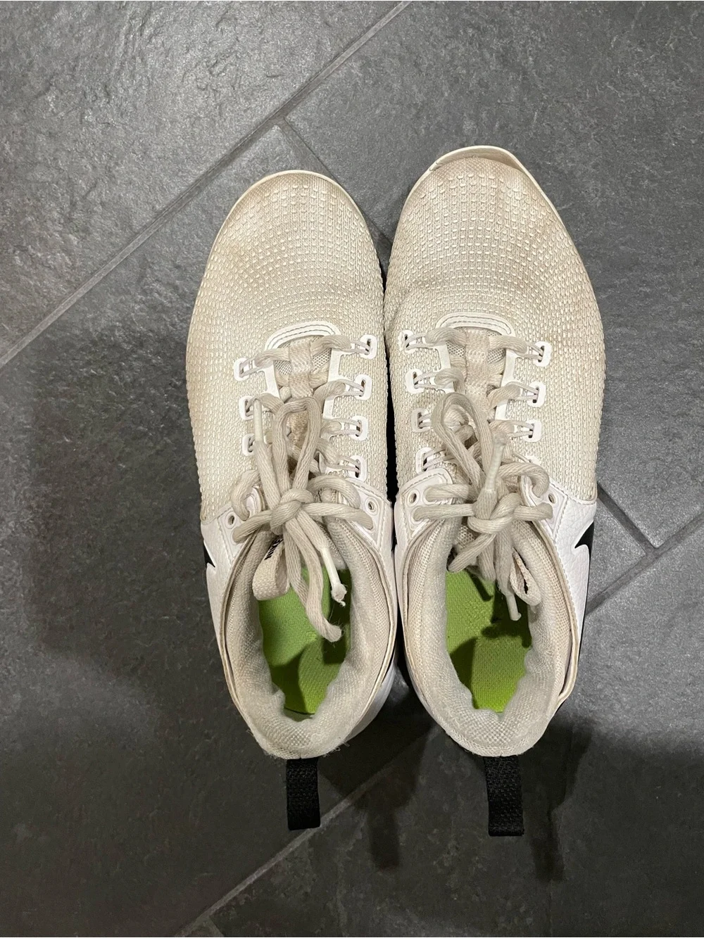 Nike White Trainers with Black Swoosh